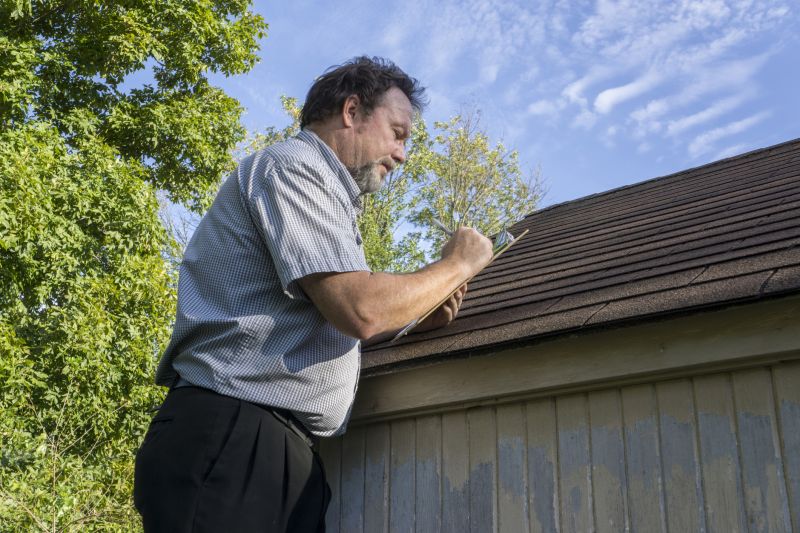 Repair Technician Inspecting Roof
